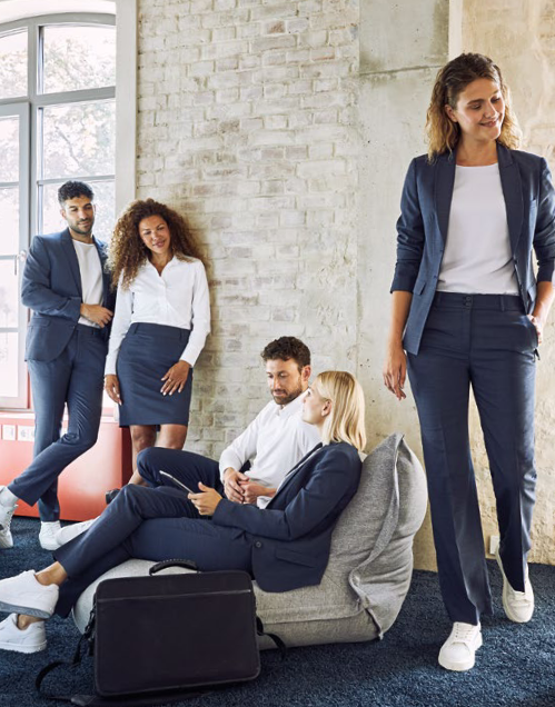 Uniformed frontline personnel wearing Modern 37.5 blazer jackets and trousers &ndash; stylish team in professional surroundings.